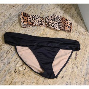 Moon Fish Swim Bikini. Cheetah Top Size M. Black Bottoms Size Large. 2 Sizes